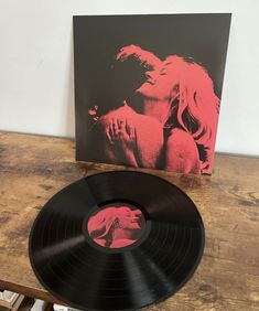 a record player and some records on a table