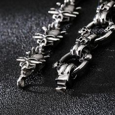 Punk Style Barbed Skull & Men's Star Bracelet Dare to stand out from the crowd with the Punk Style Barbed Skull & Men's Star Bracelet by Nevermore. Crafted with durable stainless steel, this edgy accessory is perfect for those who march to the beat of their own drum. The intricate barbed skull detail and star charm exude a punk flair that is both rebellious and cool. Elevate your look with this affordable piece that screams individuality and quality. MATERIALSMetal Type: Stainless SteelBracelet A Punk, Edgy Accessories, Men Bracelet, Punk Style, Star Bracelet, Punk Fashion, Chain Link, Bracelets For Men, Stainless Steel