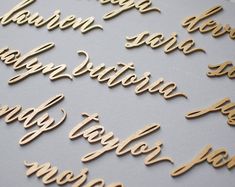 gold foiled words are arranged in the shape of letters