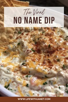 a close up of a bowl of dip with tortilla chips