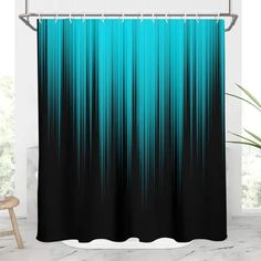 a shower curtain with blue and black stripes