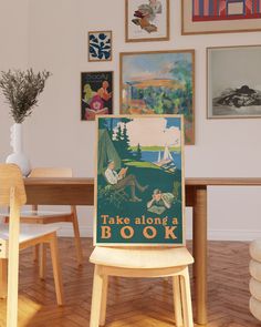 there is a sign that says take along a book on the back of a chair