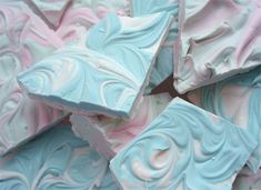 blue, pink and white swirled soap bars stacked on top of each other