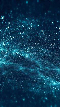 a blue background with stars and dust