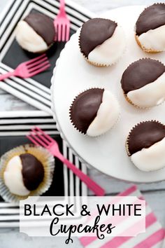 black and white cupcakes on a plate with forks