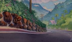 a mural on the side of a road with trees and mountains in the back ground