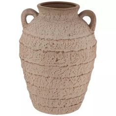 a large clay vase with handles is shown