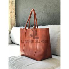 "Beautiful Oversized tan leather bag. Unlined, but it includes 3 big inside pockets. There is also the possibility to include a whole inside lining, and then we could add all the inside pockets that you need, if you are interested, please contact us. Simple and stylish. You can use it as a weekender bag, or if you need to carry a lot of stuff for your day. --------------------------------------------------------------------------------------------------- Optional: Add Zipper: The bag keeps the shape and the same aperture of the bag as if the bag had no zipper, but you can close it when necessary (you can see the bag with zipper in a couple of pictures of the black bag). Inside lining: There is also the possibility to include a whole inside lining, and then we could add all the inside pocke Large Rectangular Leather Bag, Large Brown Satchel For Daily Use, Large Rectangular Leather Shoulder Bag, Large Leather Bag For Daily Use, Large Leather Bag With Double Handle, Large Leather Satchel Bag, Large Satchel With Double Handle For Travel, Brown Shoulder Bag With Luggage Sleeve For Shopping, Brown Travel Bag With Luggage Sleeve For Shopping