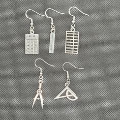 These earrings are made and modeled by women in STEM! They are for anyone who loves math or appreciates the beauty in it! Pick a pair of math earrings, and choose the material for the earring hooks. The Cubic Zirconia earrings are a bonus gift that comes free with these earrings! The CZ studs are 0.23in (6mm) in diameter, and the posts are stainless steel. The hooks for the earrings can be metal alloy or hypoallergenic 925 sterling silver. Gifts For Math Lovers, Math Earrings, Math Gifts, Math Jewelry, Women In Stem, Random Outfits, Math Gift, Clip On Earring, Love Math