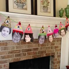 a mantel decorated with birthday hats and photos