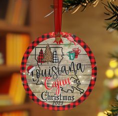 a christmas ornament hanging from a tree with the words, pennsylvania cabin christmas