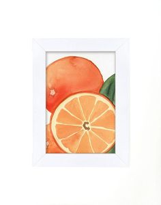 an orange is shown in a white frame