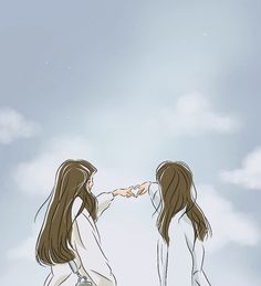 two girls are touching hands in the sky