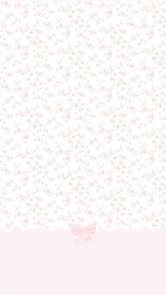 a pink and white wallpaper with flowers on it