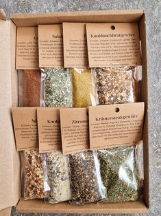 a box filled with lots of different types of spices and seasonings on top of each other