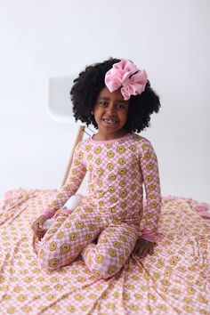 Get ready to dream big with the Blushin' Checkers Dream Set! This long sleeve dream set features a playful smiley face and blush checkered print. Made with soft and comfortable bamboo material, this dream set will have you feeling cozy and stylish at the same time. Sweet dreams ahead! Made from the softest and most breathable seasonal bamboo viscose material, your babe won't want to take this off! Designed for all the love and extra snuggles! Sleep and play with zero irritation with our tag-less Playful Cotton Sleepover Sets, Playful Yellow Sleep Set, Playful Sleep Sets With Character Print, Cotton Sleep Sets With Character Print, Playful Printed Spring Sleepwear, Boys Boxers, Dream Blanket, Bodysuit Dress, Checker Print