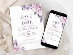 an image of wedding save the date cards on a table with flowers and leaves around it