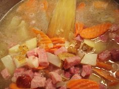 the food is being prepared and ready to be cooked in the pot on the stove