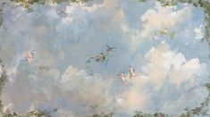 the sky is filled with clouds and cherubs