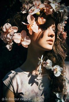 a woman with flowers in her hair