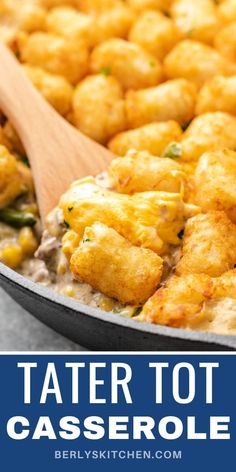 tater tot casserole in a skillet with a wooden spoon