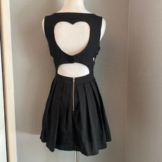 Black Dress With Heart Shaped Cutout Zipper And Bottom Closure On Back 100% Polyester Black Edgy Mini Dress With Back Zipper, Blue Slip Dress, Formal Bridesmaids Dresses, Red Strapless Dress, Pattern Dress Women, Bridesmaid Dress Sizes, Womens Floral Dress, Overlay Dress, Tie Dye Dress