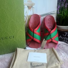 Gucci Rubber Web Womens Criss Cross Slide Sandals Coral New Shamarock. Available In Size 6 And 8. Brand New In A Box Comes With Two Dustbag And Care Card. This Is An Authentic Pair Of Gucci Rubber Web Womens Criss Cross Slide Sandals Size 38 In Coral And New Shamrock. These Stylish Sandals Are Crafted Of Red And Green Rubber. They Feature A Pink Rubber Bottom With A Crossover Band Of Gucci Classic Red And Green Web. Made In Italy Cute Slides, Green Web, Stylish Sandals, Care Card, Gucci Shoes, In A Box, Slide Sandals, Women's Shoes Sandals, Criss Cross