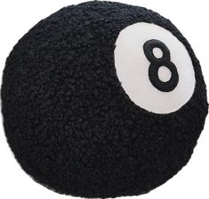 a black and white ball with the number eight on it