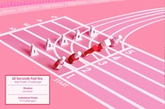 a pink poster with numbers on it and an image of a running track in the middle