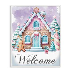 a welcome sign with a gingerbread house