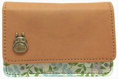 a wallet with an animal head on it