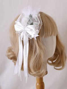 Adorn your hair with this charming feather-decorated white sweet floral bowknot hairclip. This delightful accessory features a lovely combination of white color, sweet floral design, and a decorative bowknot, making it the perfect addition to any kawaii or Lolita-inspired outfit.  Please note that this product includes only the hairclip. White Ribbon Bow For Spring, White Bow For Spring Party, White Bow With Matching Headband, White Headband With Bow Tie, White Bow Tie Headband, Cute White Party Hair Accessories, Cute White Hair Accessories For Party, Elegant White Hair Accessories With Decorative Bow, White Flower-shaped Hair Accessories With Matching Headband