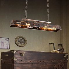 a wooden chest with lights hanging from it