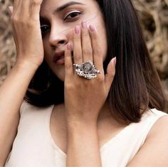 Bold and Beautiful is how we would describe this Ring. Crafted in german silver, this ring features a bold tribal motif with a pearl that adds a feminine allure to the overall look. The bold tribal face is what makes this ring so noticeable. If your love bold and chunky jewelry, this accessory is an absolute must-have! Oxidised Rings, Bangle Set, Ring With Pearl, Oxidized Ring, Maa Durga, Handmade Bangles, Chunky Jewelry, German Silver, Chic Jewelry