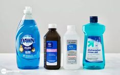 several different types of cleaning products on a marble surface