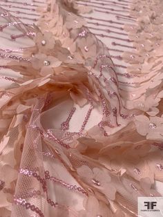 Beds of pink flowers in perfect rows are pretty as can be on this blush and pink fine netting with 3D floral chiffon appliqués and sequins detailing designer fashion fabric. SKU: 12322 Content: Polyester Color: Blush / Pink Width: 50 inches This fabric is a last cut and no longer in production. Once sold out, we are unable to get more. Color Blush, Floral Chiffon, Fabric Gifts, Pink Fabric, Fashion Fabric, Blush Pink, Pink Flowers, Designer Fashion, Quality Fabric