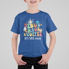 a young boy wearing a blue t - shirt with the words jesus chaos and coffee on it