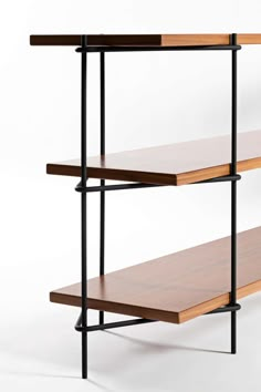 two wooden shelves with black metal frames and wood top, one shelf is open to the other