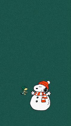 a snowman with a red hat and scarf standing in front of a green background