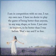 a woman is standing in a field with her arms outstretched and the words i am in competition with no one, i run my own race