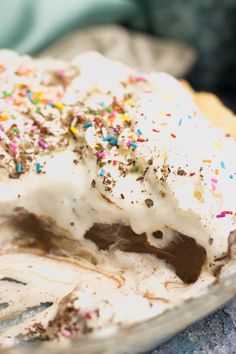 an ice cream sundae with sprinkles and chocolate