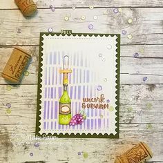 some wine corks are next to a card