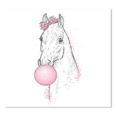 a white horse with a pink ball in its mouth and a pink bow on it's head