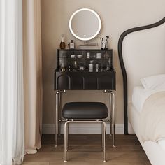 a white bed sitting next to a mirror on top of a dresser