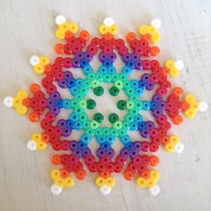 the colorful beads are arranged in a circular pattern