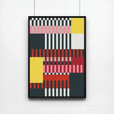 an abstract painting hanging on the wall