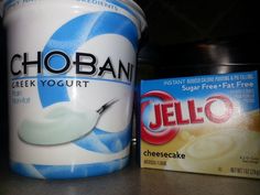 a yogurt container next to a carton of jello on a counter