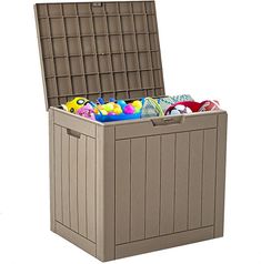 an outdoor storage box with lid open and various items in the bottom compartment, on a white background