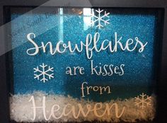 there is a sign that says snowflakes are kisses from heaven