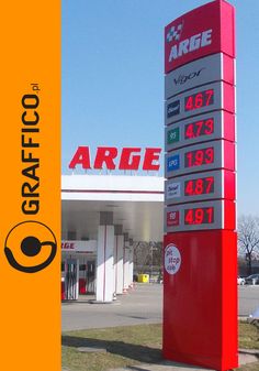 a gas station sign in front of an orange and white building with the words arge written on it